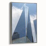 Framed canvas featuring a colorful vintage poster art of NYC skyline with black border, ideal for office decor.