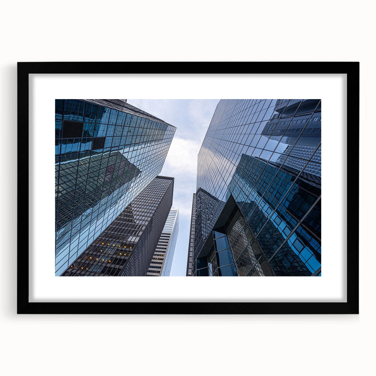 Extra large abstract art print of New York City's Wall Street in vibrant colors on a textured canvas, framed in black.