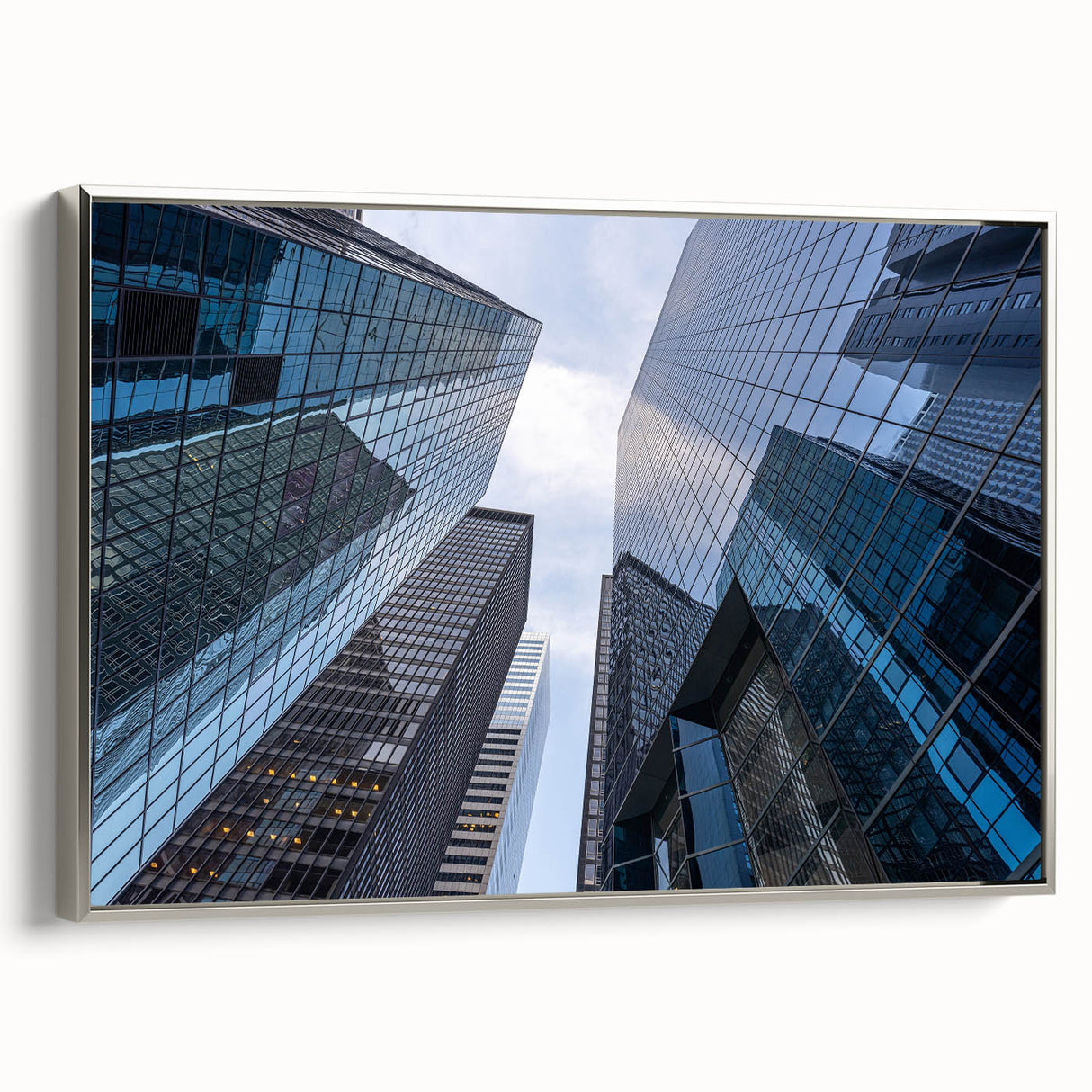 Framed canvas of a vintage-style New York City Wall Street scene in muted grayscale with splashes of color.