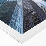 Art deco poster of NYC Wall Street in muted gray and blue tones on rolled canvas, suitable for dining room wall art.