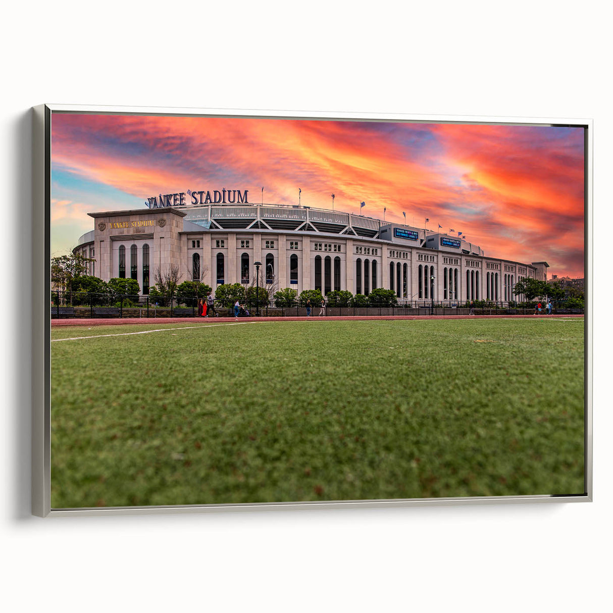 Framed canvas of a vintage-style New York City landscape painting, featuring colorful art on a black background.