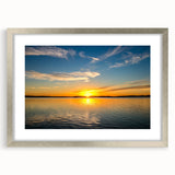 Textured abstract art print of Oklahoma scenery in muted earth tones, framed in silver, ideal for bedroom decor.