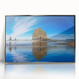 Mid-century modernist art depicting Oregon's Cannon Beach with muted gray and blue tones on a framed acrylic print.