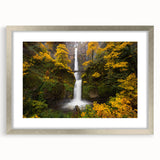 Textured art print of Multnomah Falls in Oregon, featuring vivid green and blue tones on a framed silver mat.