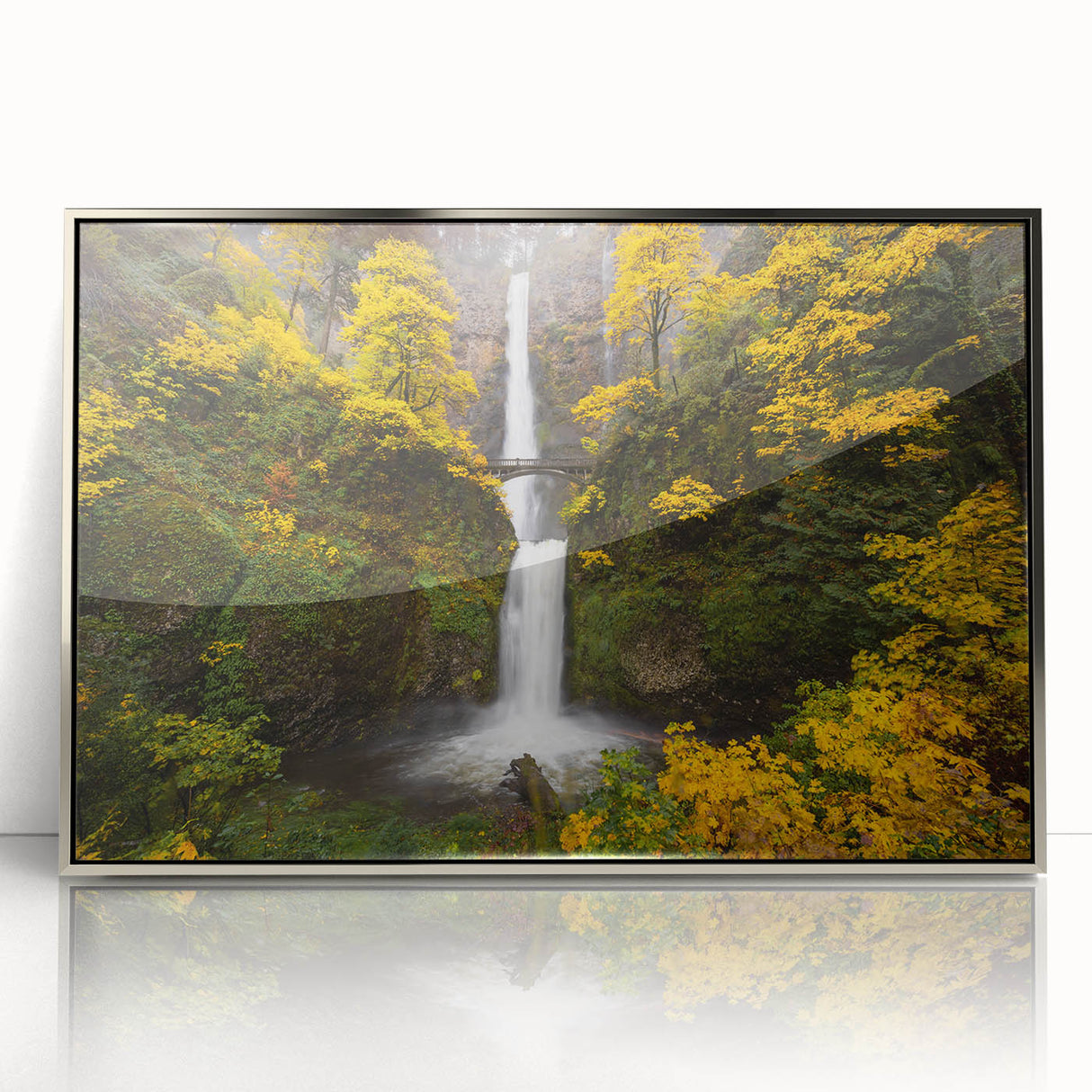 Mid-century modernist art of Multnomah Falls in Oregon, depicted in vibrant green and blue tones on a framed acrylic print.