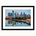 Abstract art print of Philadelphia skyline in vibrant colors on a large textured canvas, ideal for living room decor.