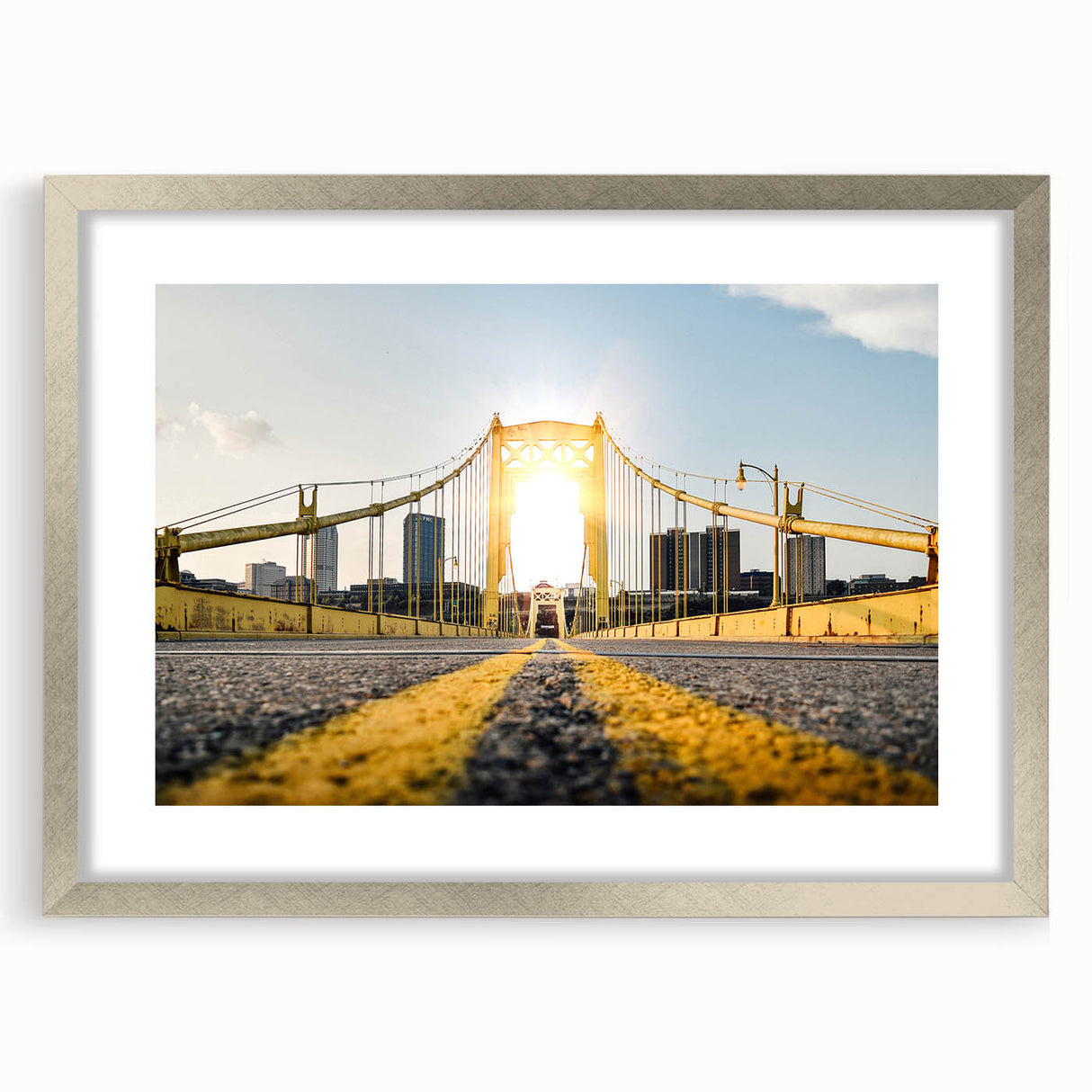 Textured abstract art print depicting the Pittsburgh skyline in muted gray tones, framed in silver, ideal for bedroom art.