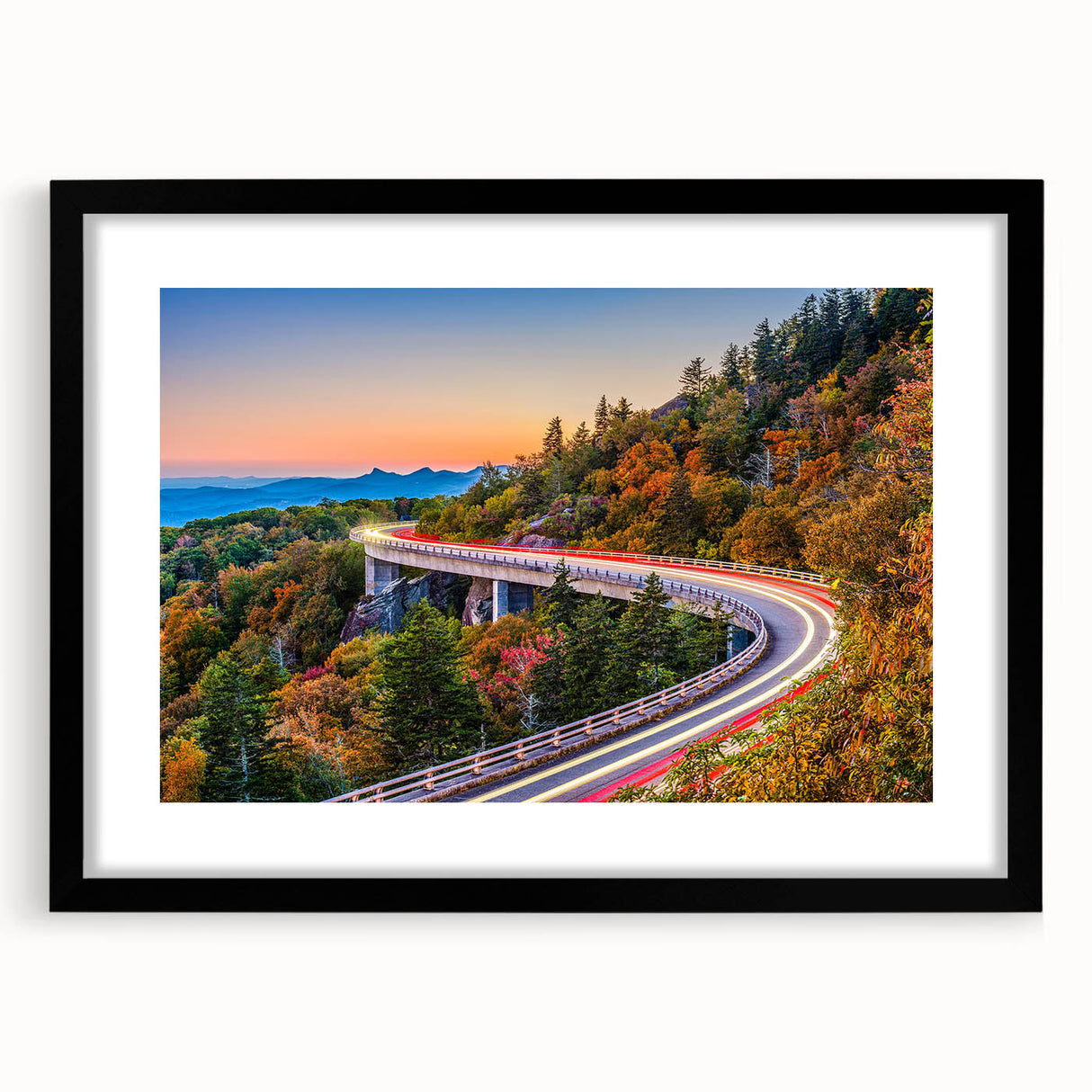 Colorful abstract art print of textured South Carolina scenery on a large black framed canvas, ideal for living room decor.