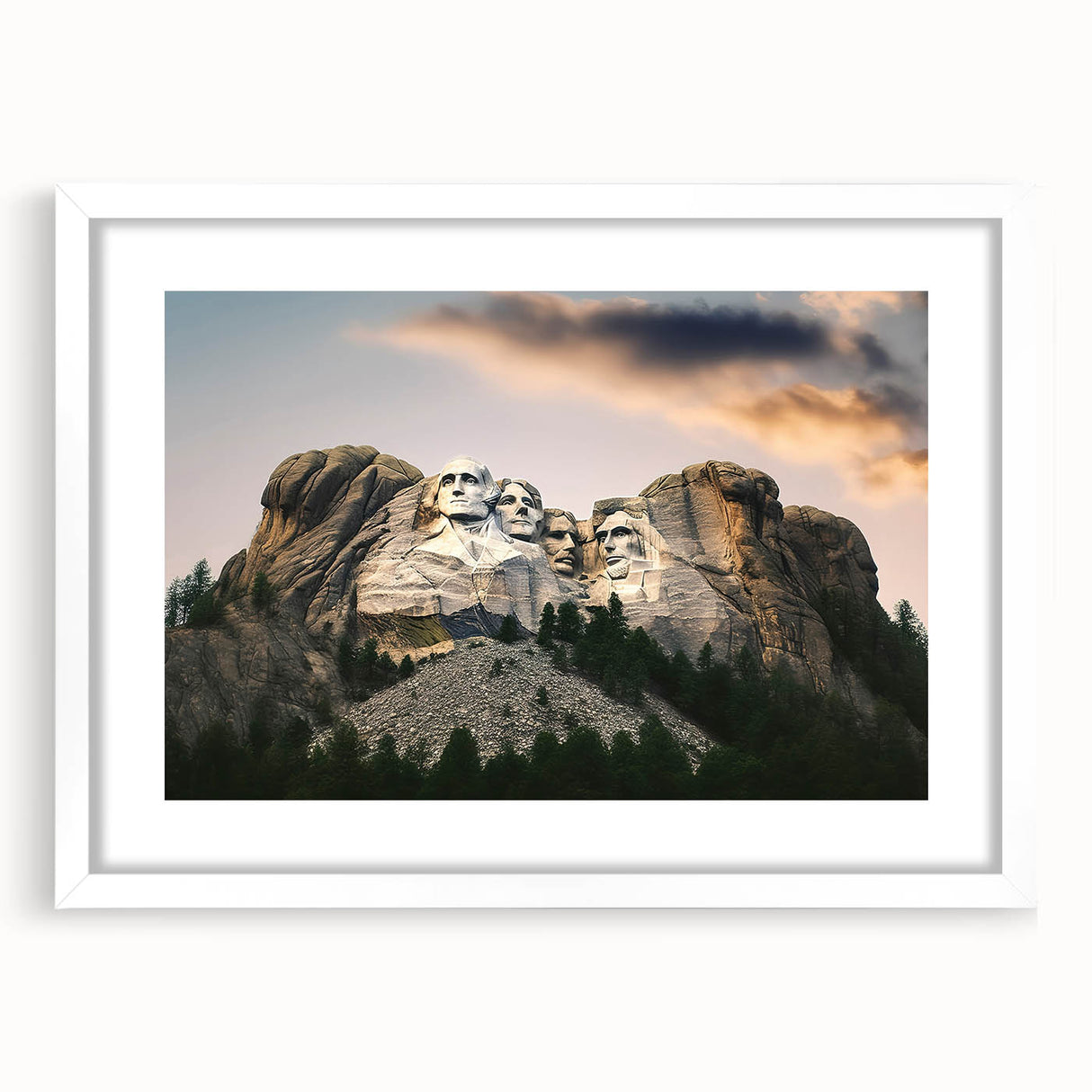 Abstract art print of Mt. Rushmore in muted earth tones on a framed white mat, suitable for bedroom or dining room decor.