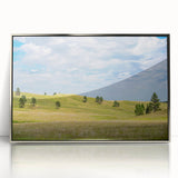 Mid-century modernist art depicting South Dakota scenery in muted earth tones on a silver-framed acrylic print.