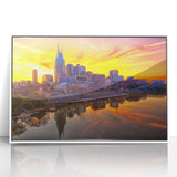 Framed acrylic print of Nashville skyline in art deco style with pastel blue and pink shades.