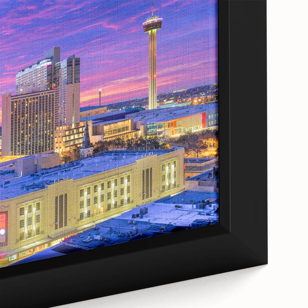 Extra large framed canvas of a textured, colorful San Antonio skyline on a black background, ideal for living room decor.