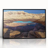 Large abstract wall art of Canyonlands with vivid orange and red tones on black framed acrylic.
