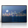 Large abstract wall art of Seattle skyline in muted gray and blue tones, acrylic print in black frame.