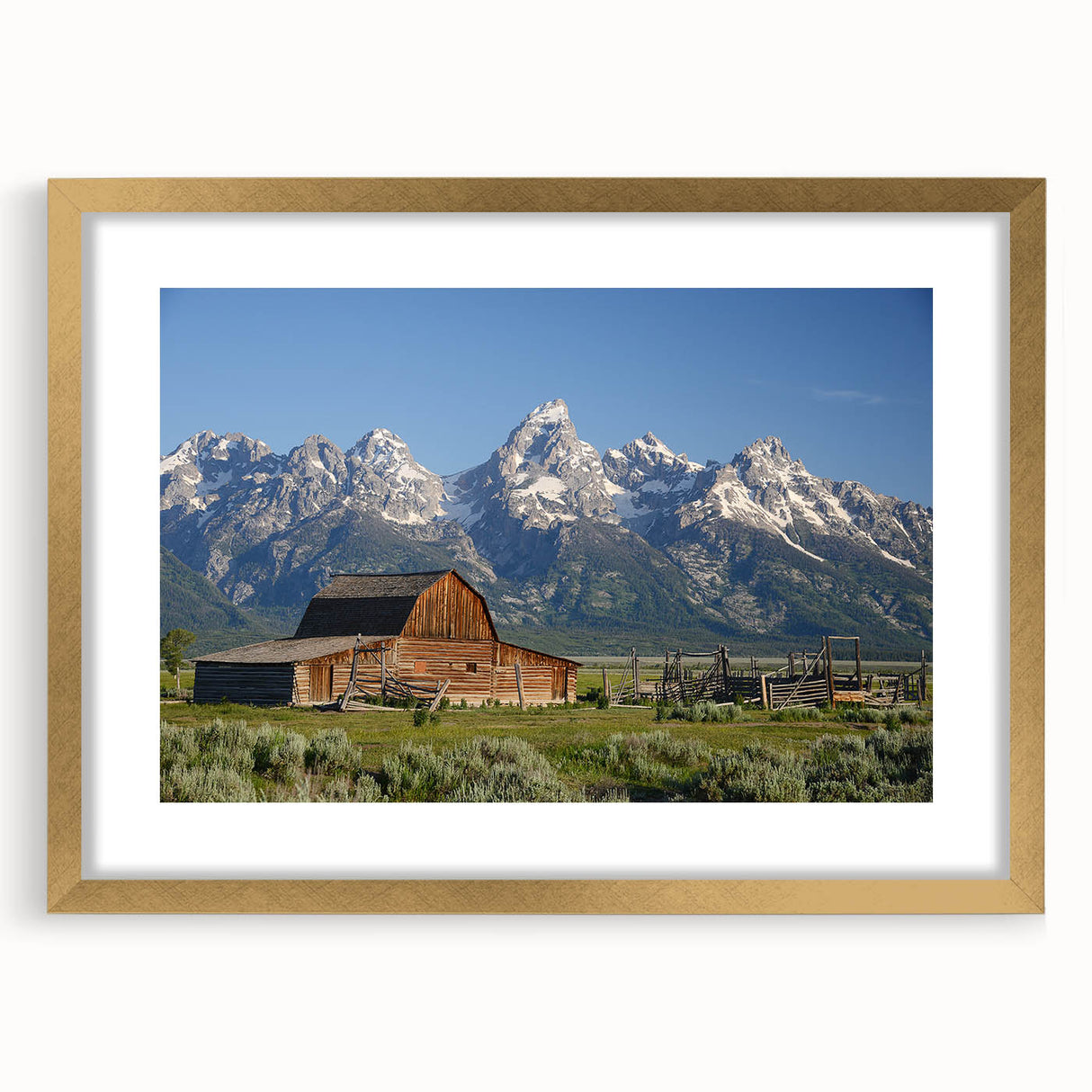 Extra large framed print of the Grand Tetons, featuring textured abstract art in muted earth tones.