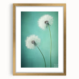Floral and botanical frame with a gold mat, showcasing intricate flower and leaf designs against a white background, ideal for home decor and elegant displays.