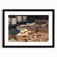 Colorful, abstract art print of a textured African landscape in vibrant hues on a large framed canvas.