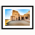 Extra large abstract art print depicting a colorful Moroccan landscape on textured canvas, framed in black.