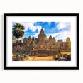 Extra large, colorful art print of an abstract Cambodian landscape in vibrant hues on a textured canvas, framed in black.
