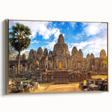 Framed canvas featuring a vintage-style landscape painting of a Cambodian scenery in muted gold and black tones.