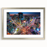 Textured art depicting abstract Seoul skyline in muted gray and blue tones on a framed silver mat.