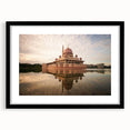 Abstract art print of a vibrant, colorful Malaysian landscape on textured canvas, framed in black.