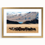 Extra large wall art featuring a textured abstract print of a Mongolian landscape in muted earth tones, framed in gold.