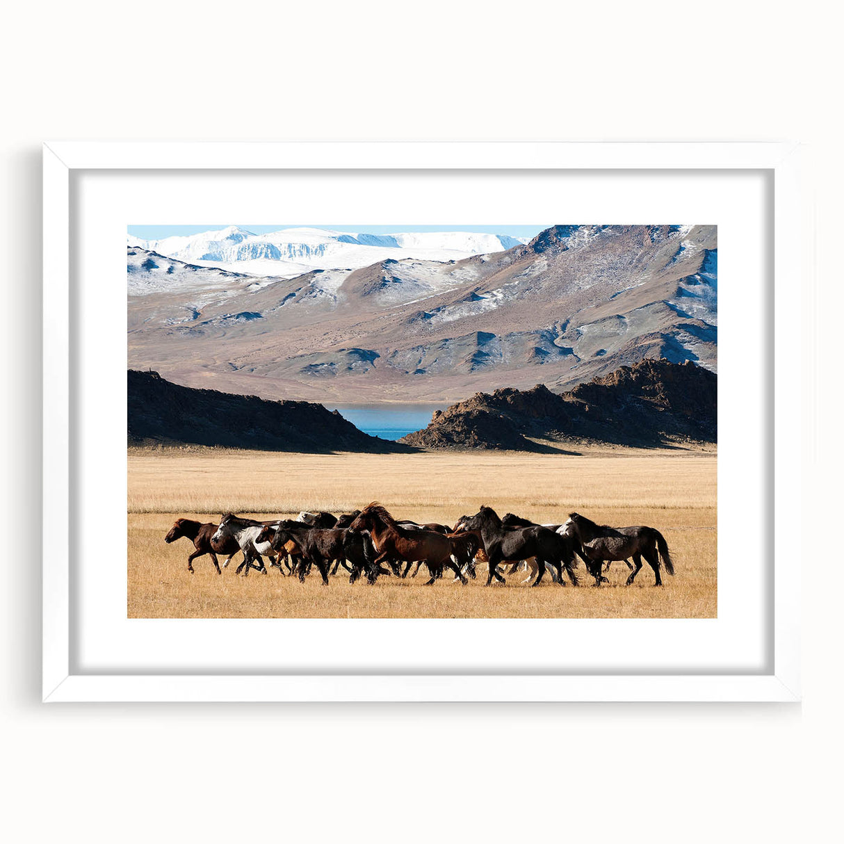 Abstract art print featuring a minimalist Mongolian landscape in muted earth tones on a framed white mat.