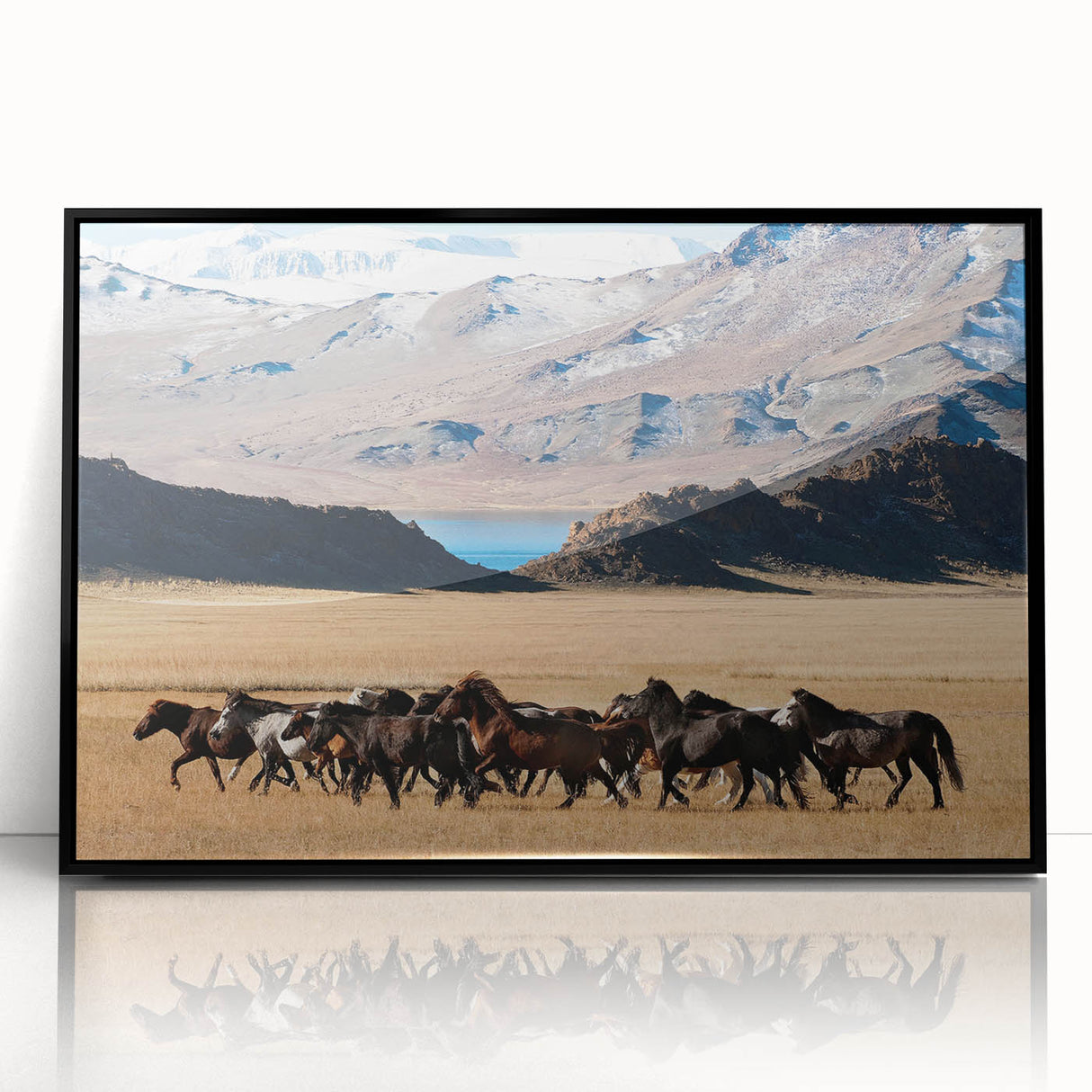 Large abstract wall art depicting a Mongolian landscape in earth tones on a black framed acrylic print.