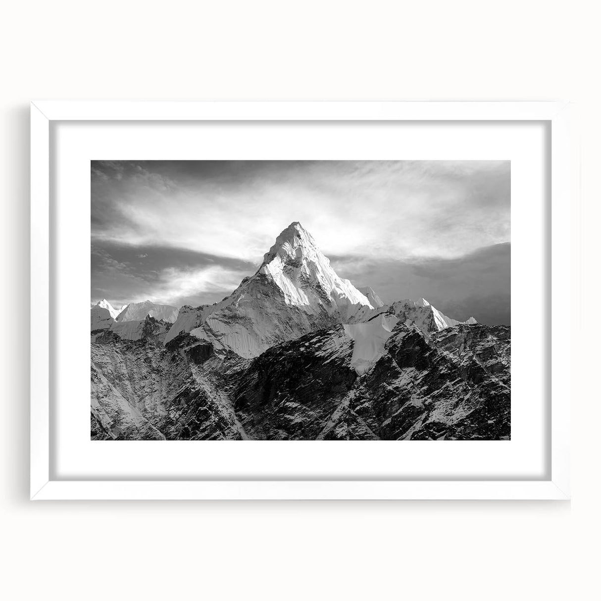 Abstract art print of Mount Everest in muted blue and gray tones on a framed white mat.