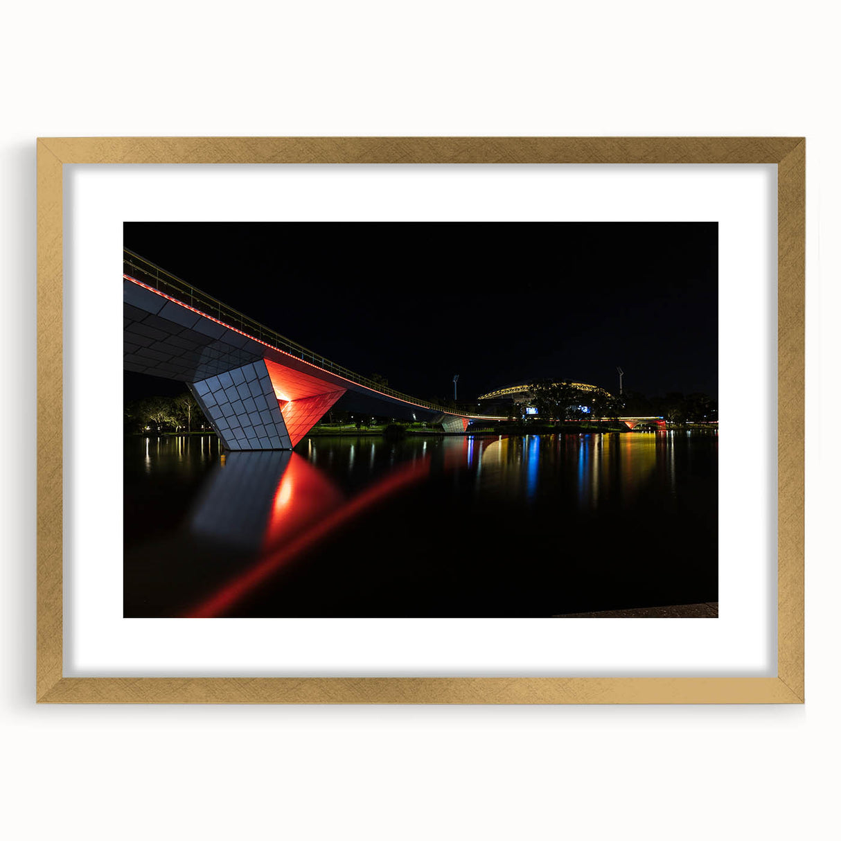 Textured abstract art print of Adelaide scenery in muted earth tones, framed in gold, suitable for bedroom decor.