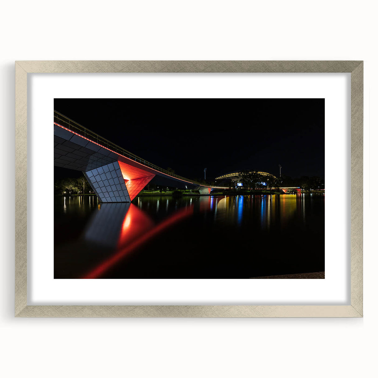 Abstract art print of Adelaide scenery in muted blue and green tones, framed in silver, ideal for dining room decor.