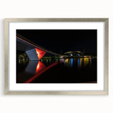 Abstract art print of Adelaide scenery in muted blue and green tones, framed in silver, ideal for dining room decor.