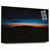 Large abstract depiction of Ayers Rock in Australia on an acrylic glass, featuring earthy red and orange tones.