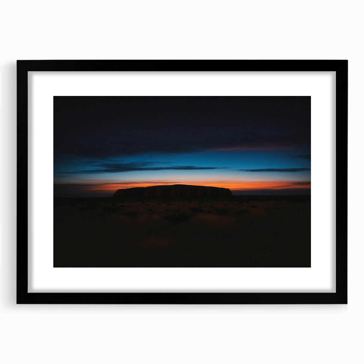 Extra large framed abstract art print of Ayers Rock in vibrant, textured colors, ideal for living room decor.
