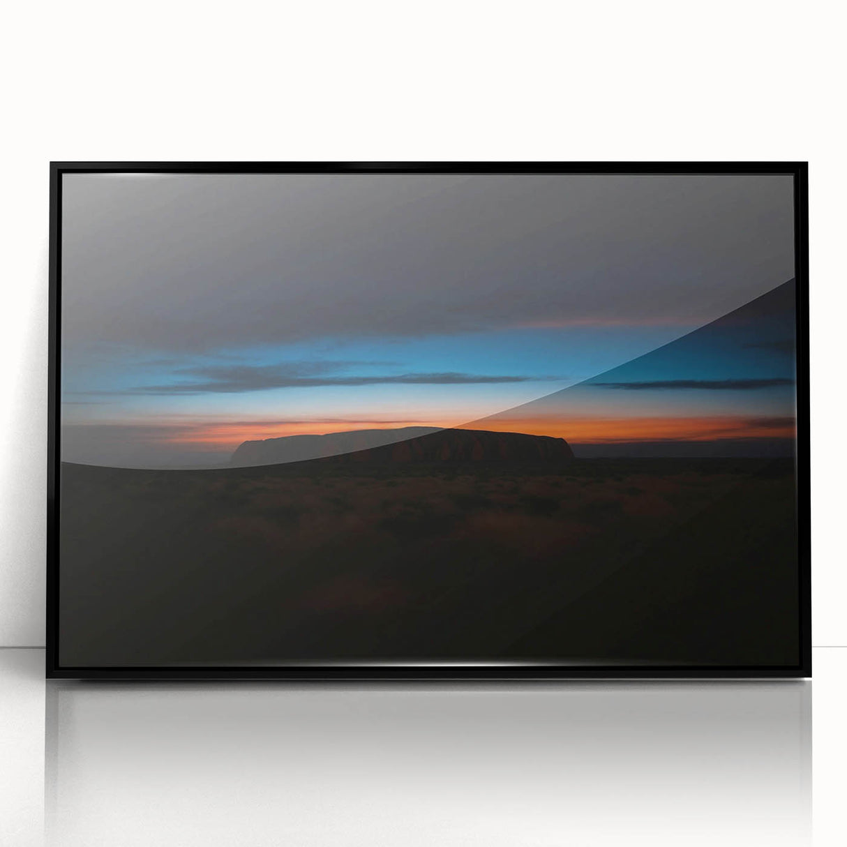 Large abstract wall art of Ayers Rock in muted earth tones, framed in black acrylic, suitable for modern decor.