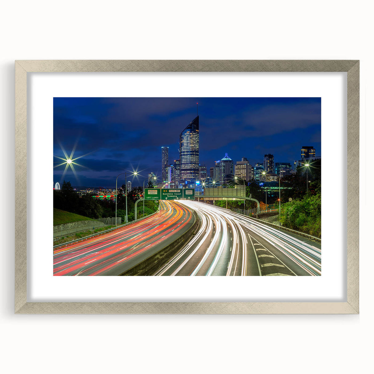 Abstract art print of Brisbane skyline in muted blue and gray tones on a framed silver mat, suitable for dining room decor.