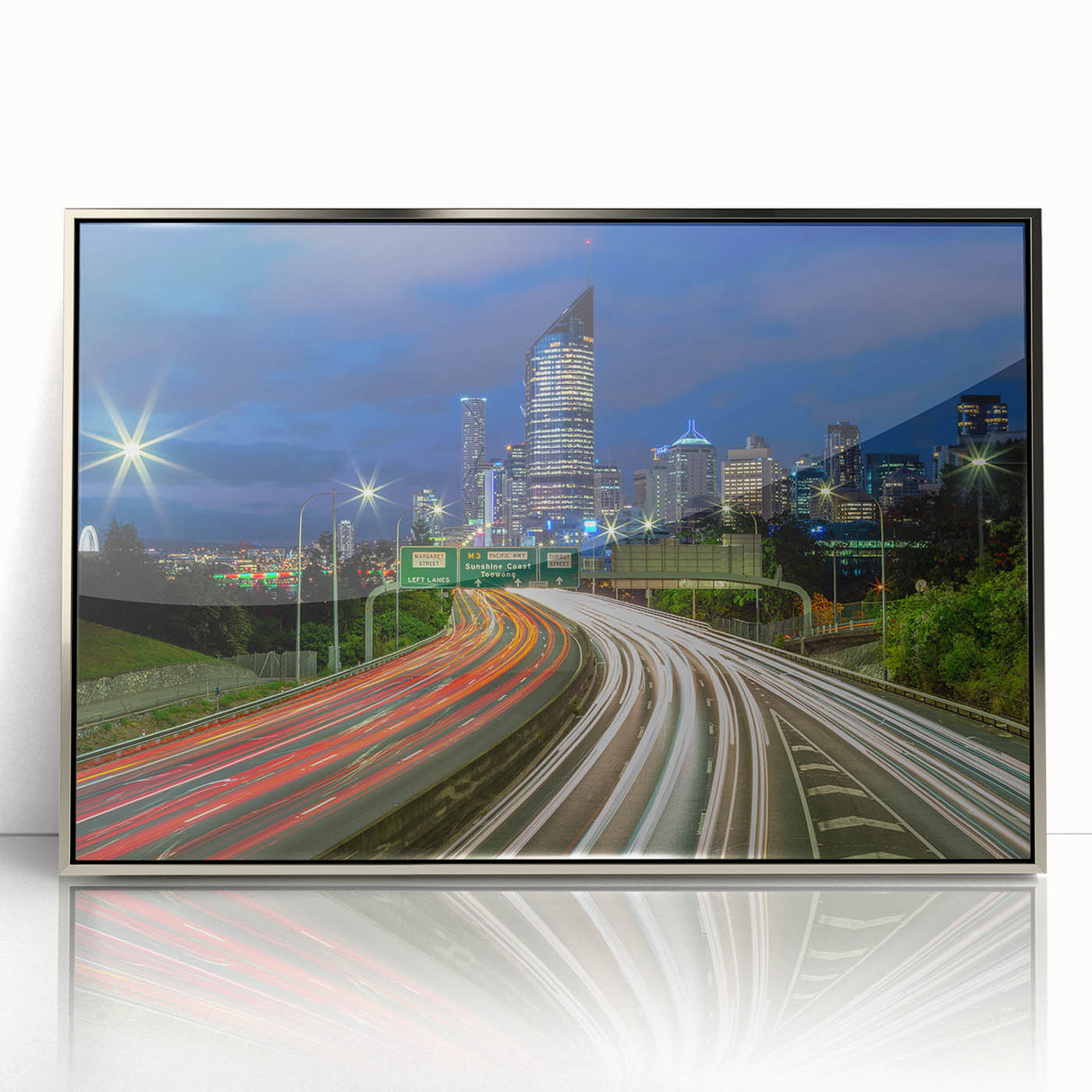 Framed acrylic print of Brisbane skyline in art deco style, featuring muted silver and blue tones.