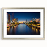 Abstract art print of Melbourne skyline in muted blue and gray tones on a framed canvas, suitable for dining room decor.