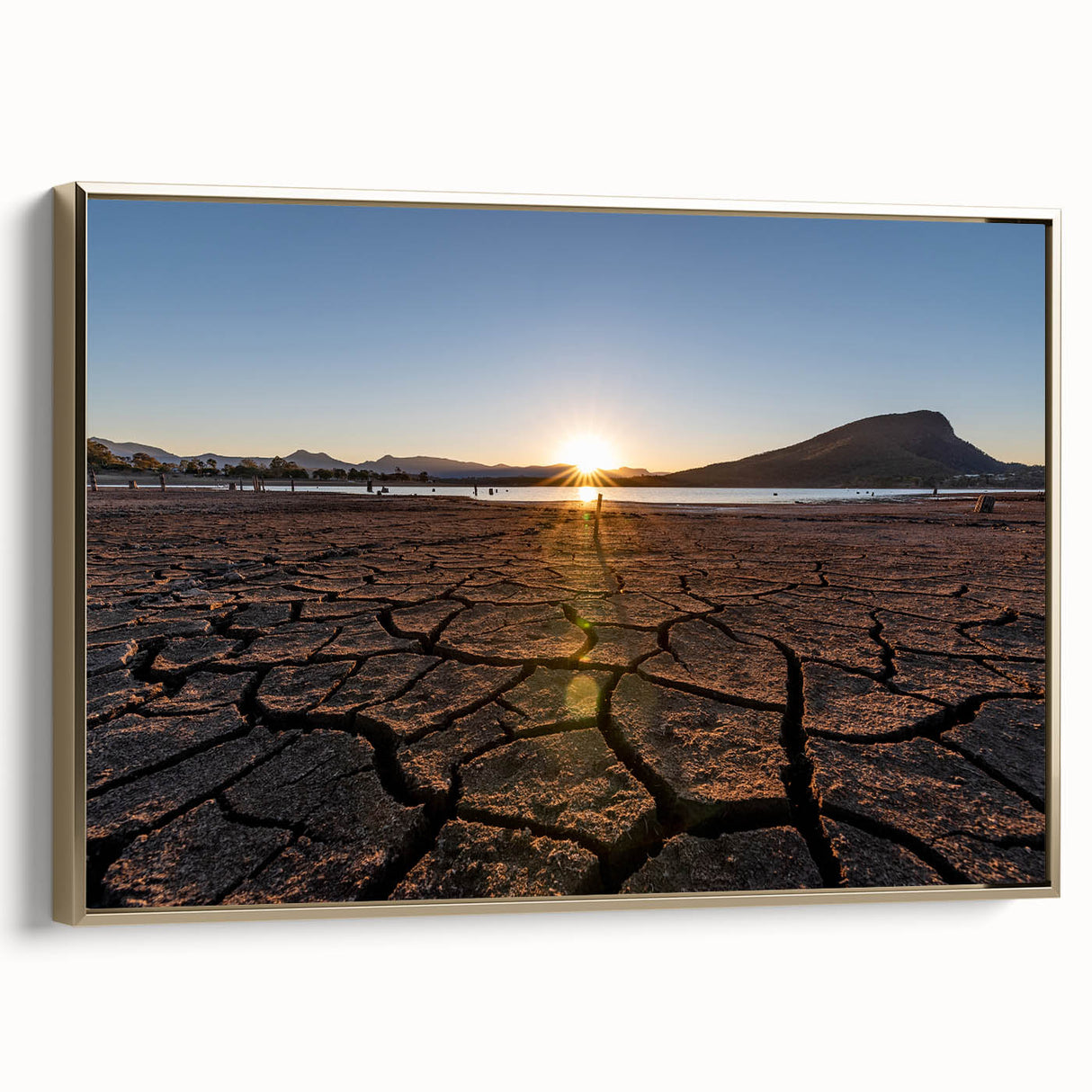 Framed canvas depicting a vintage-style Queensland landscape in muted gold and black tones, ideal for bedroom wall art.