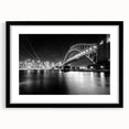 Extra large abstract art print of Sydney scenery in vibrant colors on a textured canvas, framed in black.