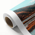 Art deco poster of Nova Scotia scenery on rolled canvas, in muted earth tones, ideal for nursery wall art.