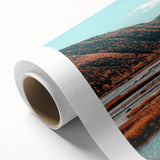 Art deco poster of Nova Scotia scenery on rolled canvas, in muted earth tones, ideal for nursery wall art.