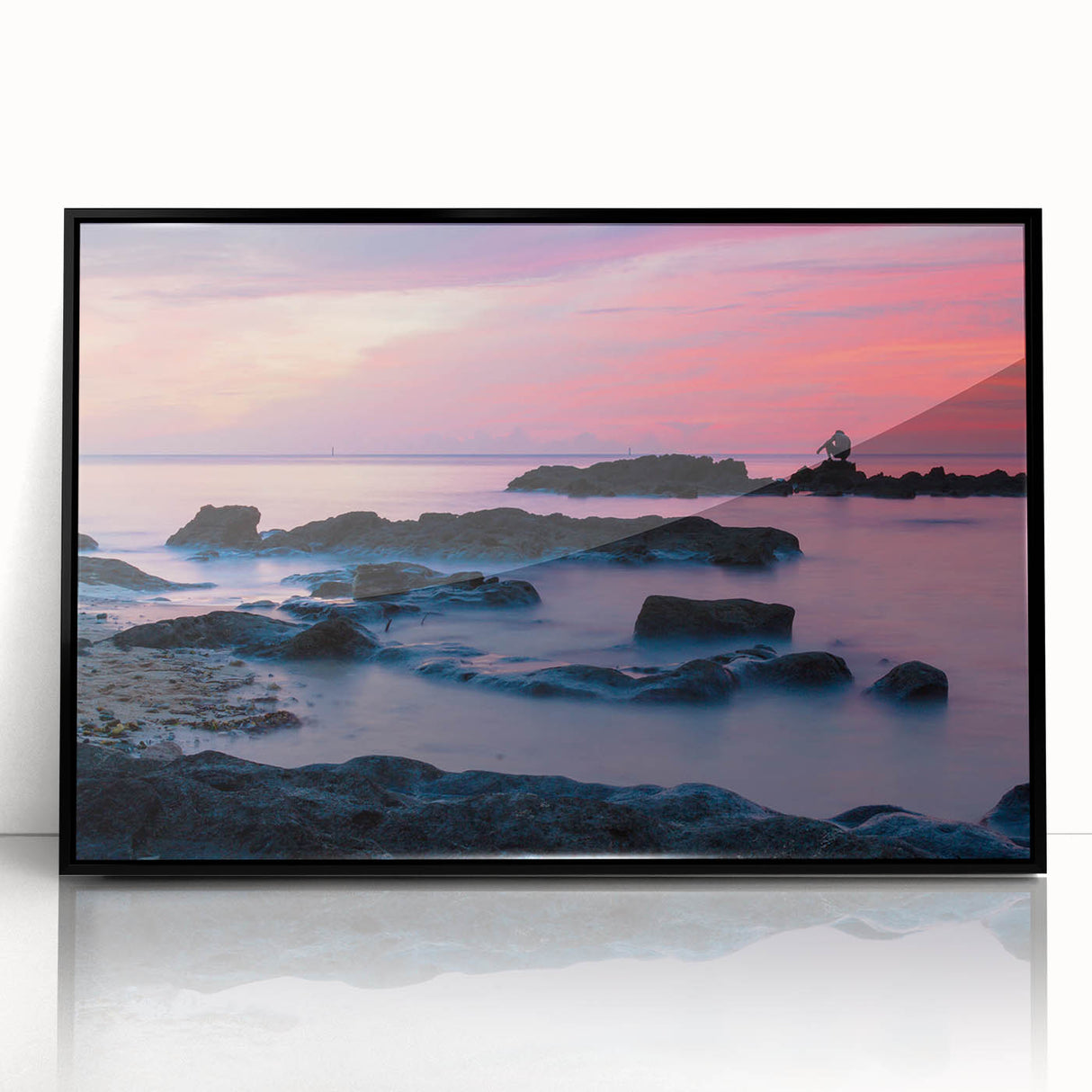 Large abstract wall art featuring Caribbean scenery in vibrant blue and green tones, displayed in a black acrylic frame.