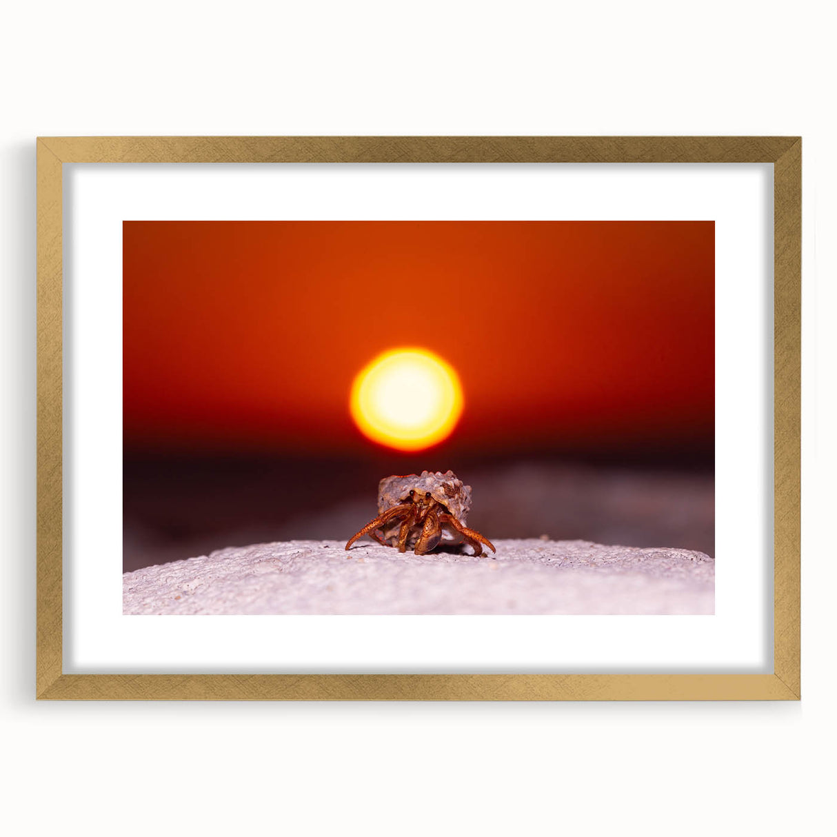 Abstract art print of a Caribbean scene in muted blue and green tones, framed in gold, suitable for dining room décor.