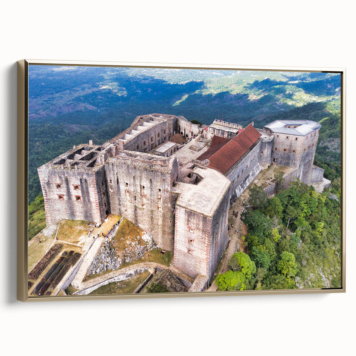 Framed canvas of a vintage-style Caribbean landscape with gold accents, ideal for bedroom wall art.