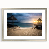 Extra large abstract art print depicting a Caribbean scenery in vibrant blues and greens, framed in silver.
