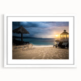 Textured abstract art print of a Caribbean scenery in muted blue and green, framed with a white mat.