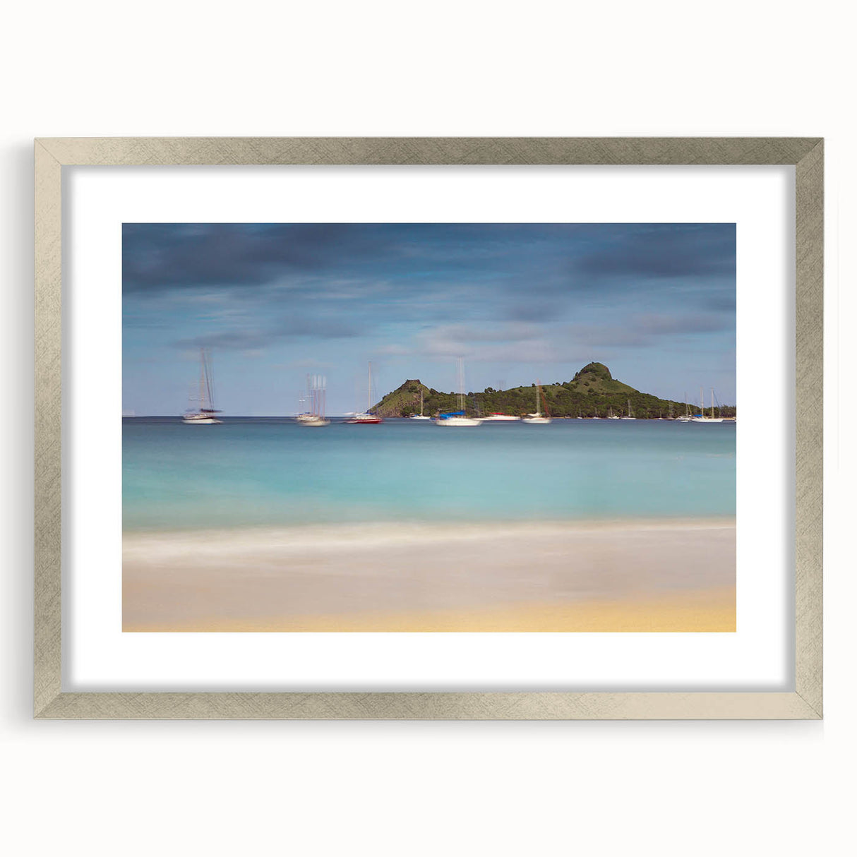 Textured abstract art print of Caribbean Saint Lucia in muted blue tones on a silver-framed mat, suitable for bedroom decor.