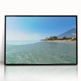 Large abstract wall art featuring a Caribbean scene in muted blue and green tones on a framed acrylic.